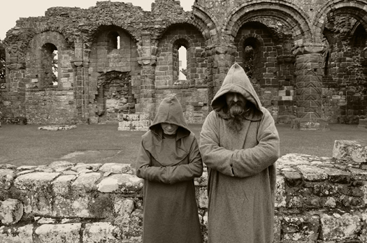 Two monastic figures on Lindisfarne